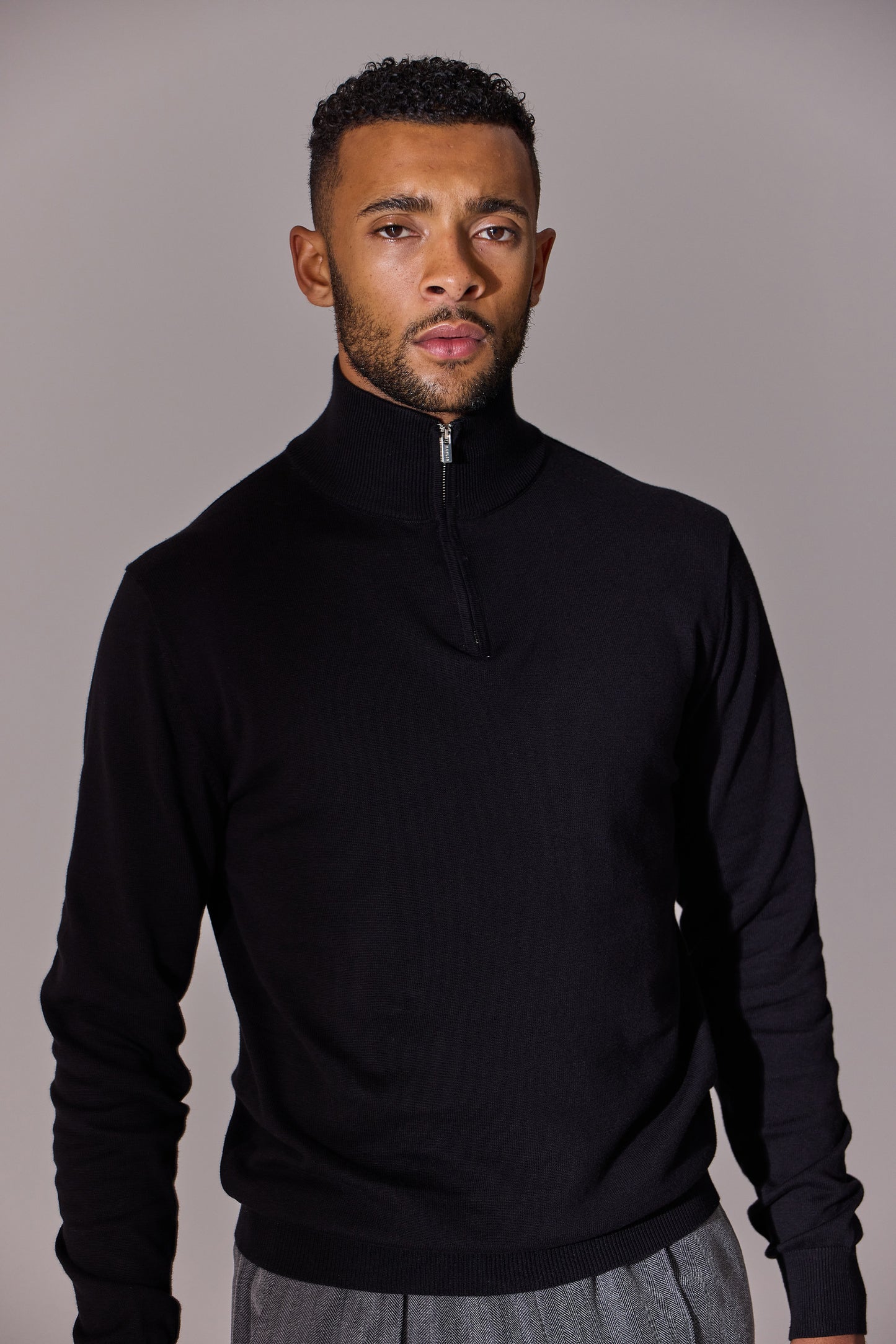 Black colour, long sleeve with zip collar polo shirt for men. Maklin Clothing.