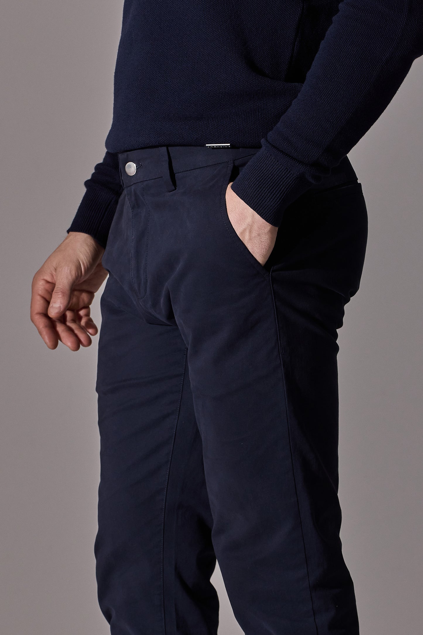Maklin Clothing's slim fit navy blue chino trousers for men.