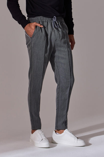 Maklin Clothing's grey coloured Herringbone smart joggers for men.