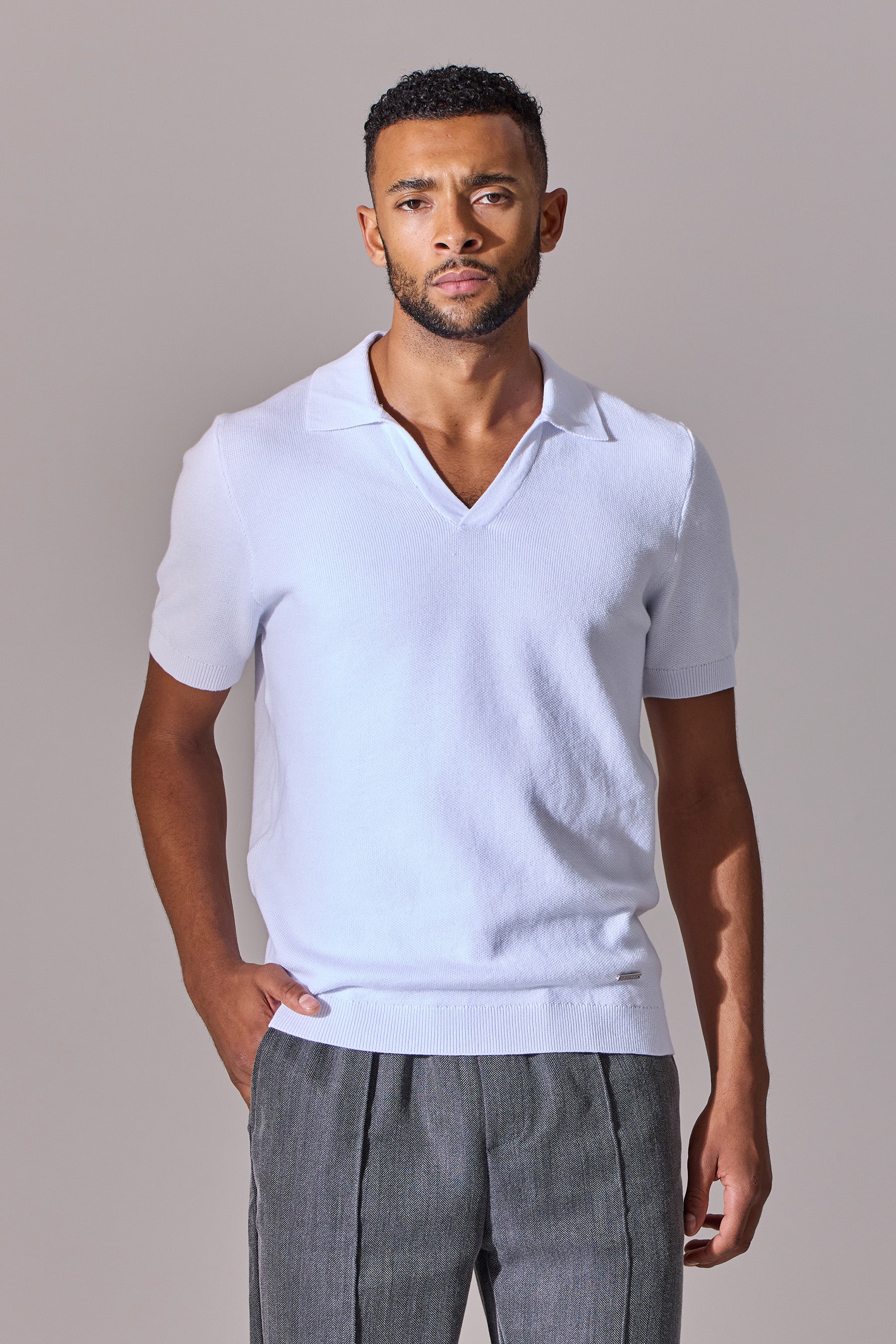 Polo shirts for men. White, short sleeve, open collar. Maklin Clothing.