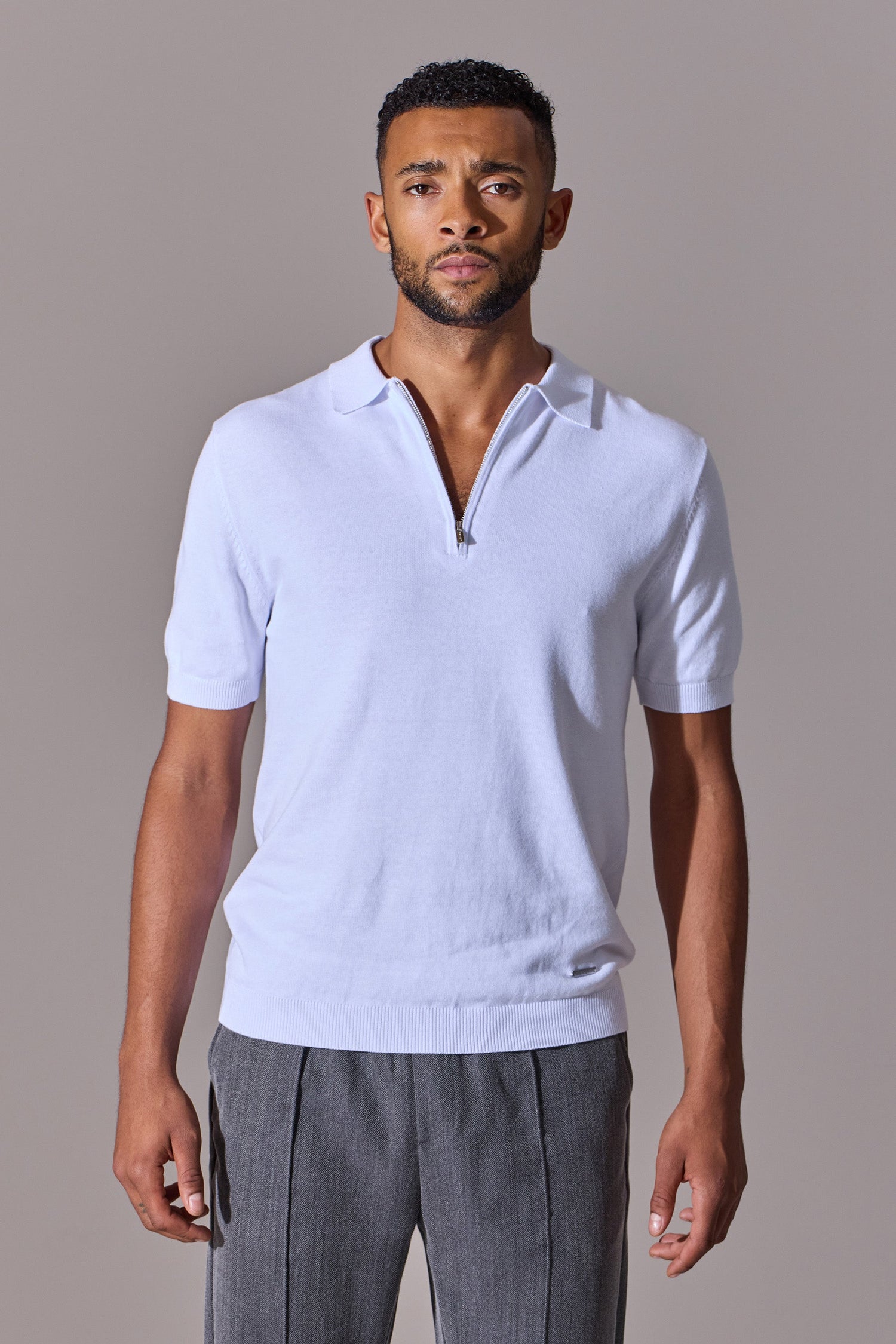 White short sleeve polo shirt for men. Maklin Clothing.