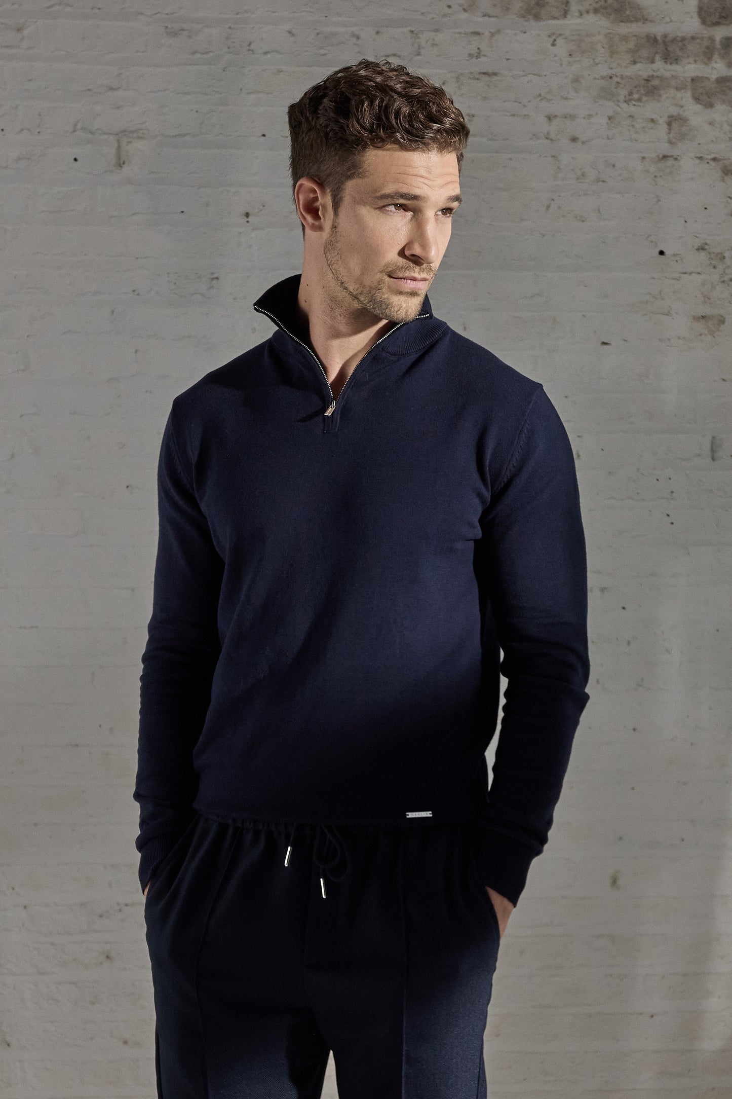Navy blue polo shirt for men. Long sleeve, zip collar. From Maklin Clothing.