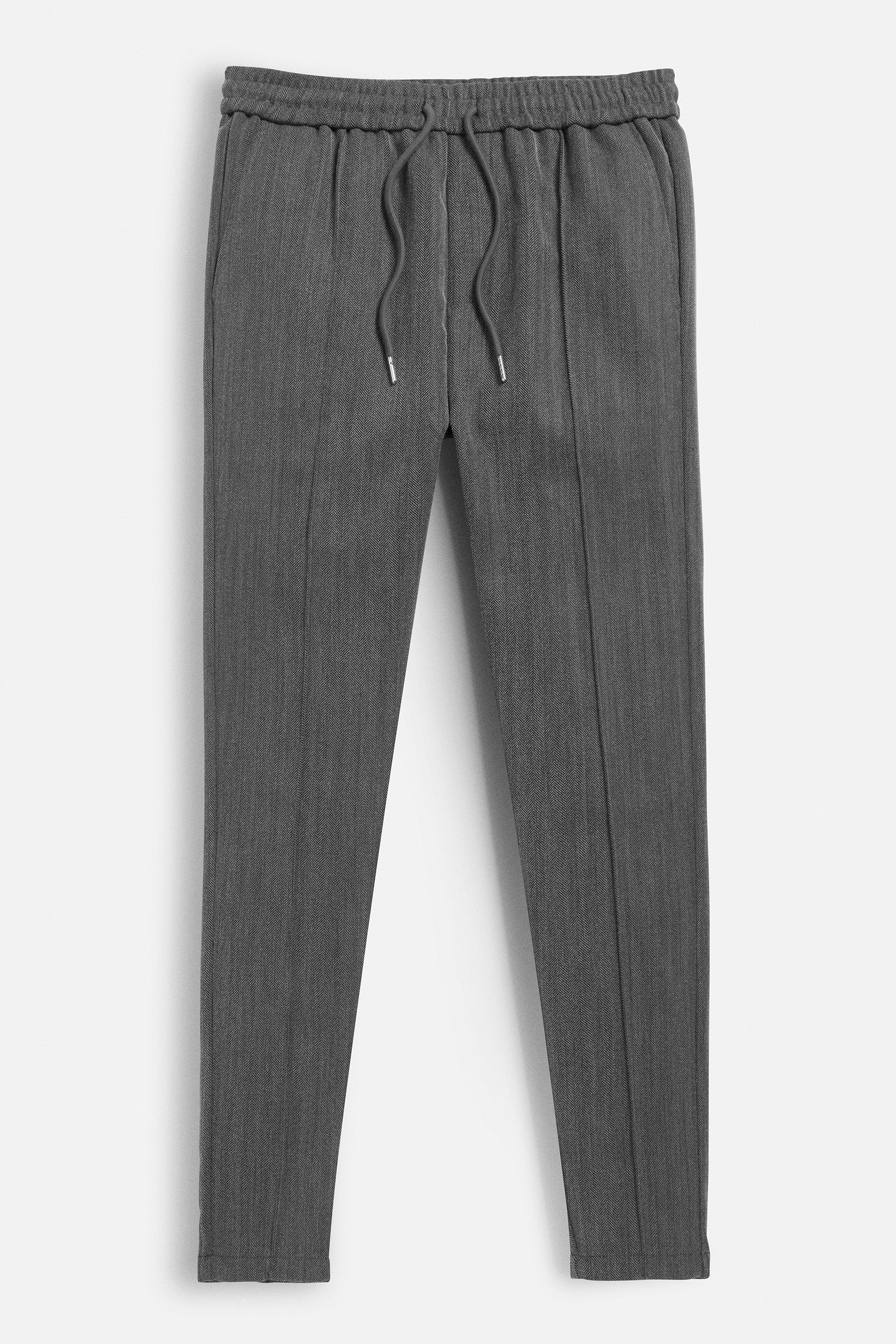 Men's dark grey Herringbone trousers from Maklin Clothing.